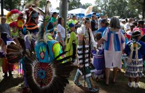 Group of people dressed in Native American clothing
