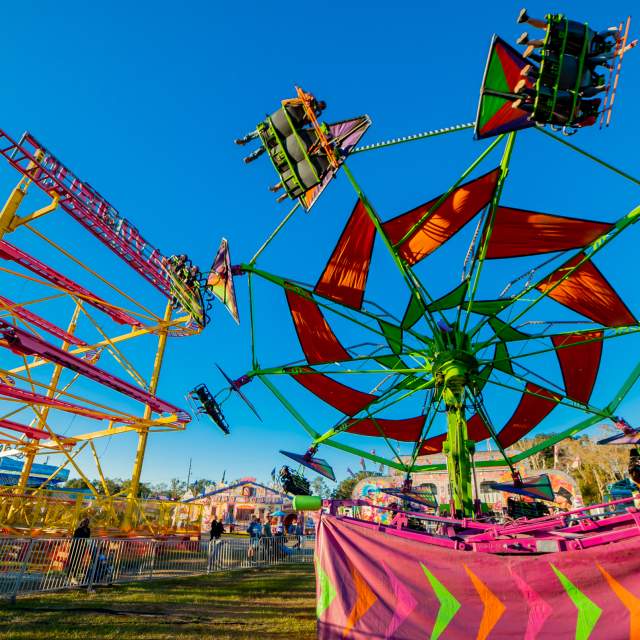 A view of brightly colored fair rides