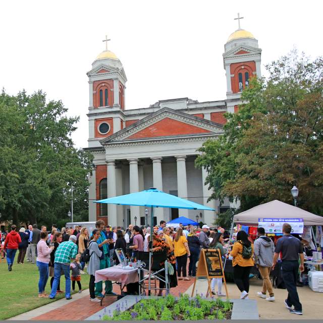group of people enjoying various grilled cheese samples