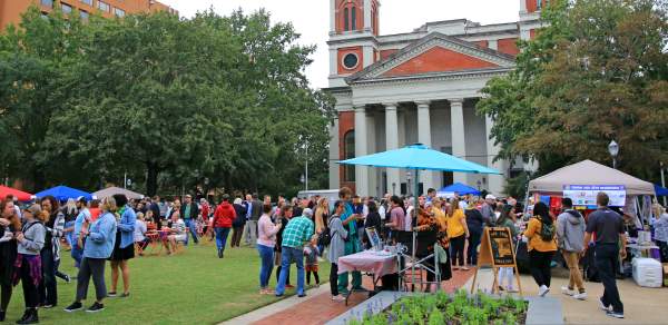 group of people enjoying various grilled cheese samples