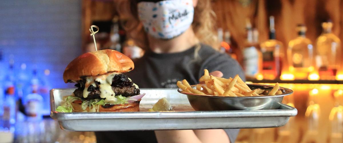 Burger and fries on a food tray