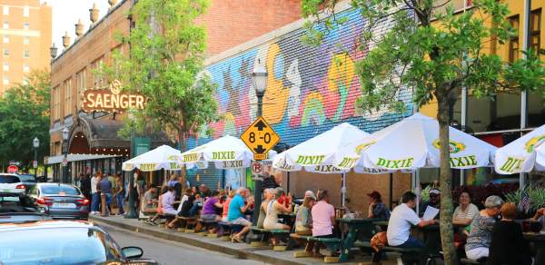 art lining the streets at the loda art walk in mobile alabama