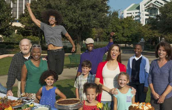 group of happy people in the park