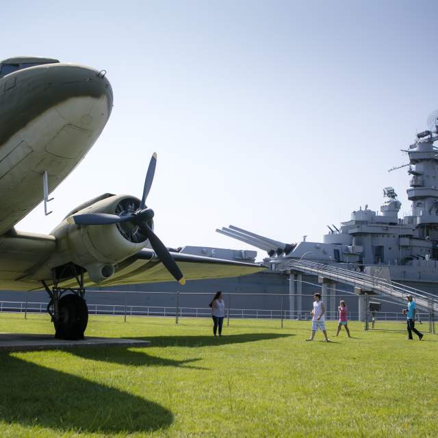 military airplane and USS Alabama Battleship