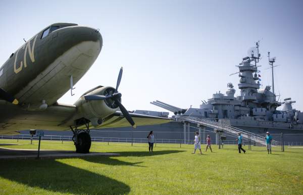 military airplane and USS Alabama Battleship