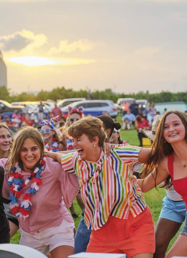 Group of people dancing at USS ALABAMA Battleship Memorial Park