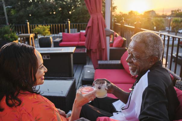 A couple at "Grace" rooftop bar in Downtown Mobile, AL.