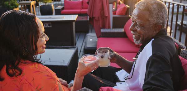 A couple at "Grace" rooftop bar in Downtown Mobile, AL.