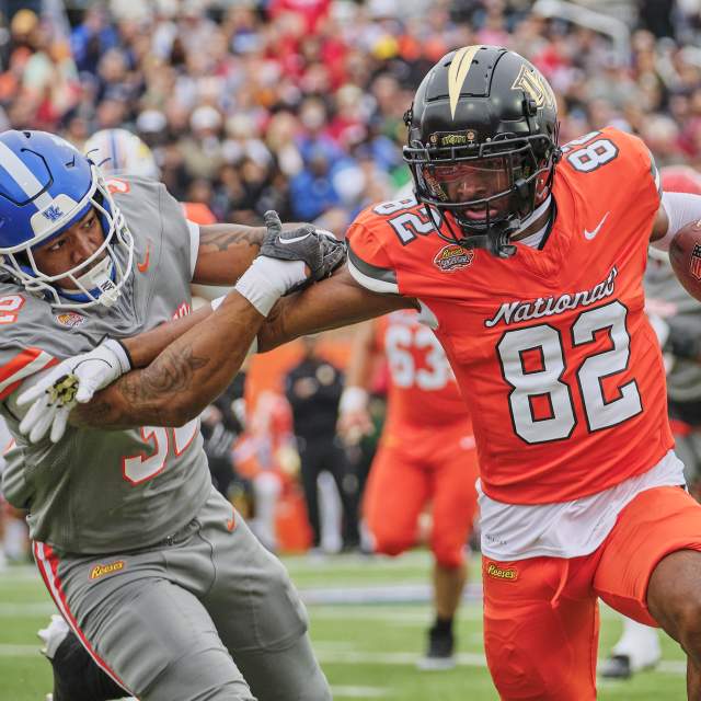 Two men playing football
