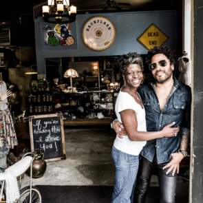 man and woman standing in a store front in mobile alabama