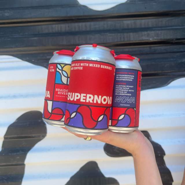 three cans of beer with red and purple labels