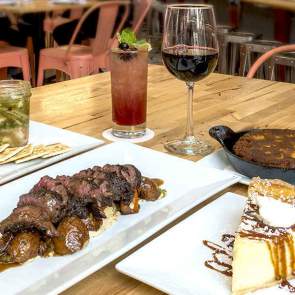 a table set with food at a restaurant in mobile al