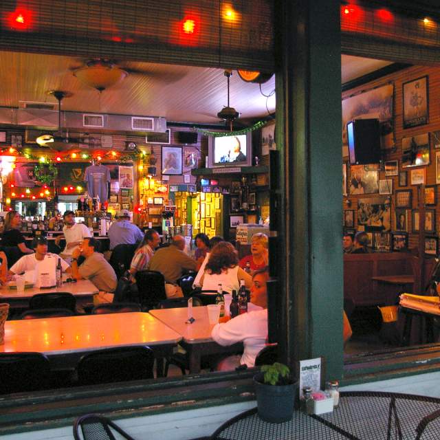 people listening to music in a restaurant in mobile al