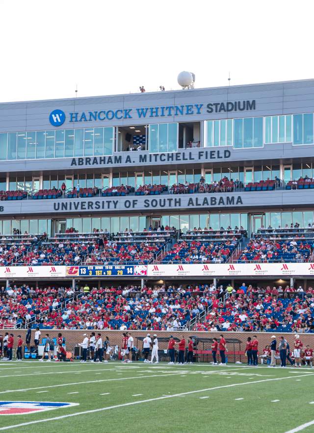 Football field with fans in the stands