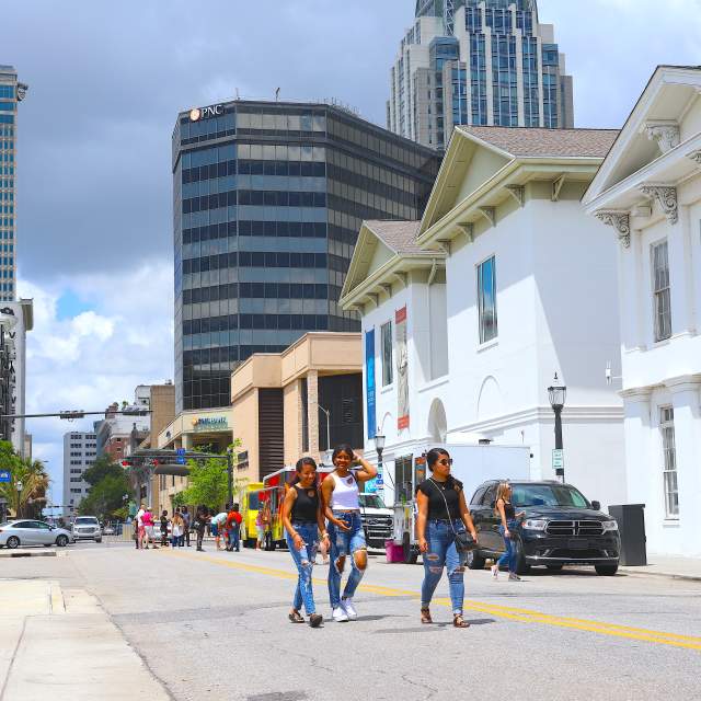 People walking in the street downtown Mobile