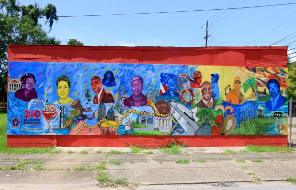 Colorful mural of various faces
