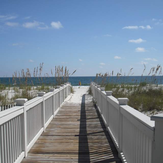 wooden walkway leading to the beach
