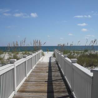 wooden walkway leading to the beach