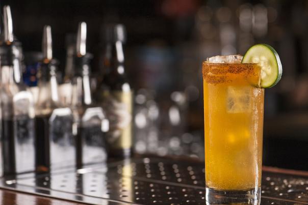 orange cocktail with lime