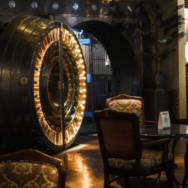 Lighted vault door, table and chairs