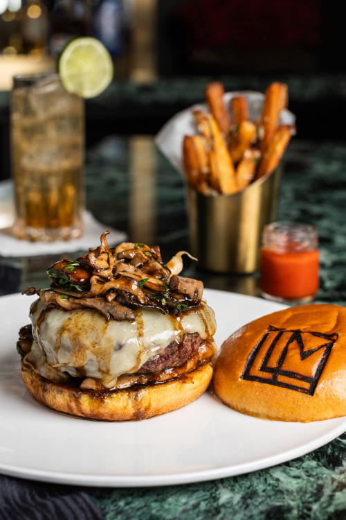 Mason Hills Farm Burger, Seared Foie Gras, Foraged Mushrooms, Caramelized Onions, Gruyere, Bordelaise Sauce, Brioche Bun, Pomme Frites
