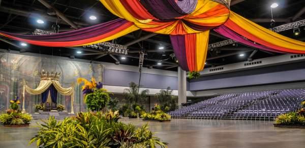 large colorful ribbons draped across the ceiling