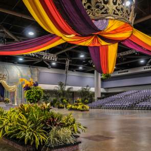 large colorful ribbons draped across the ceiling