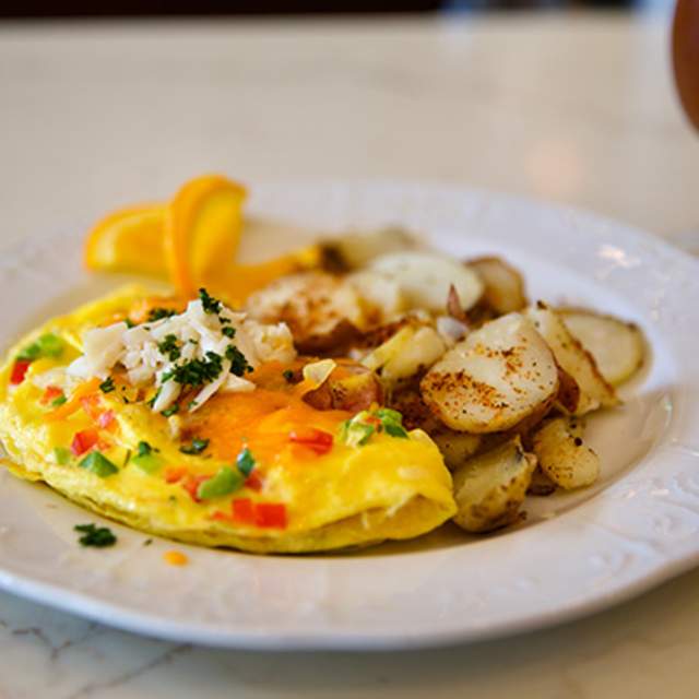 Plate of omelet and potatoes