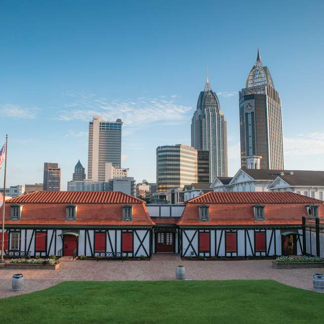 historic fort with high rise buildings in the background