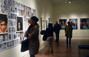 People Enjoying Art In A Mobile, AL Art Gallery