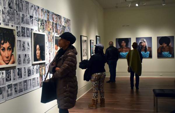 People Enjoying Art In A Mobile, AL Art Gallery