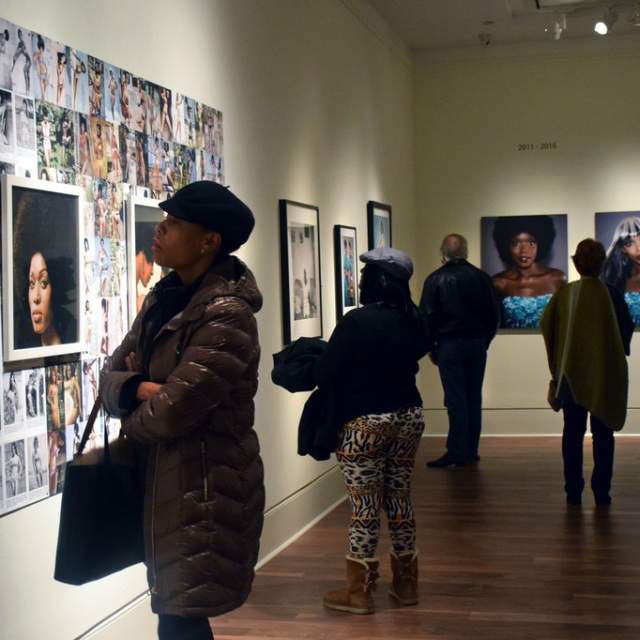 People Enjoying Art In A Mobile, AL Art Gallery