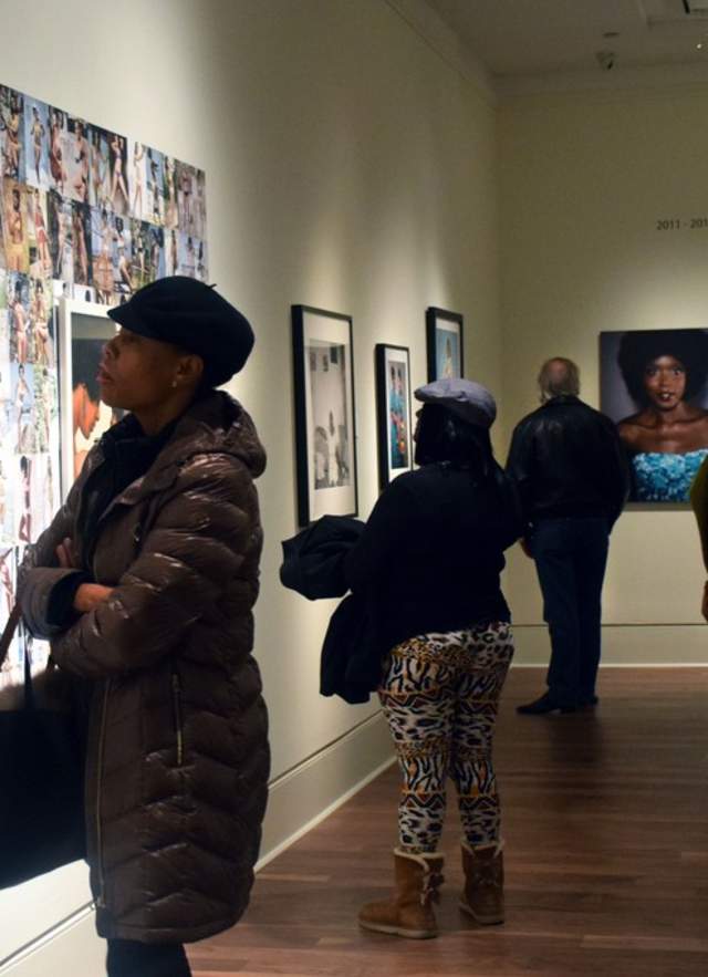 People Enjoying Art In A Mobile, AL Art Gallery