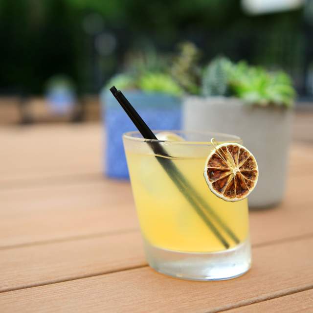 an artisanal cocktail on a table