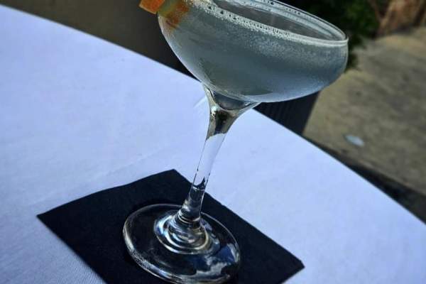 Martini with orange garnish