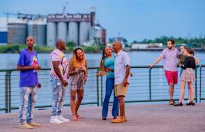 Group of people on the waterfront at Cooper Riverside Park