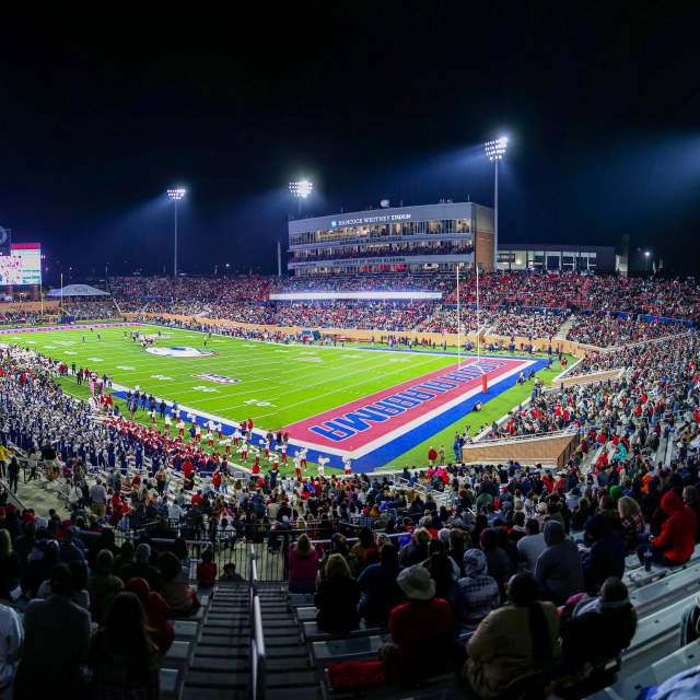 football field with fans at night