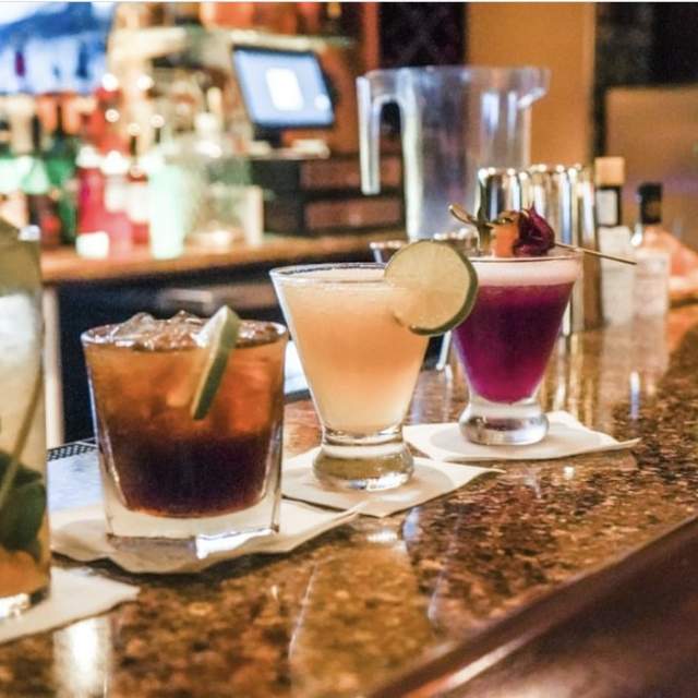 cocktail sitting on a bar