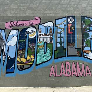 Welcome to Mobile street art painted on the side of a building